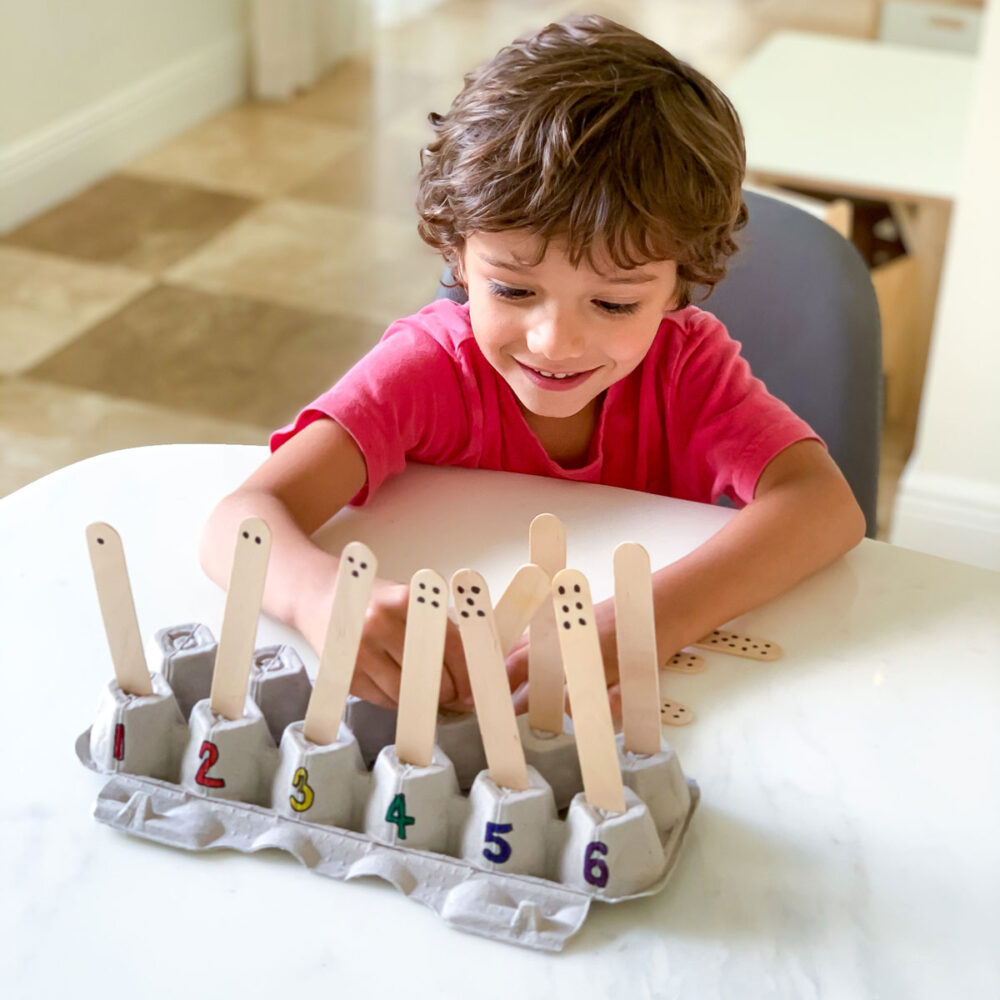 hand made number matching game from egg carton