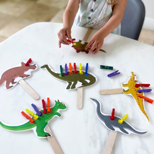 dinosaur activity with clothespins pegs for fine motor skills color matching and number learning free printable