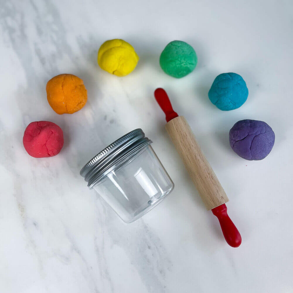 making play dough into rainbow swirls