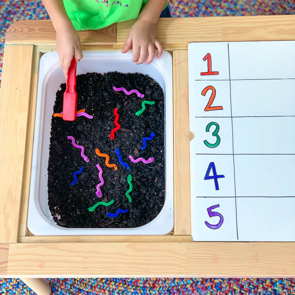 This is a counting activity for toddlers using pipe cleaners and a magnetic wand to learn number symbols and practice counting