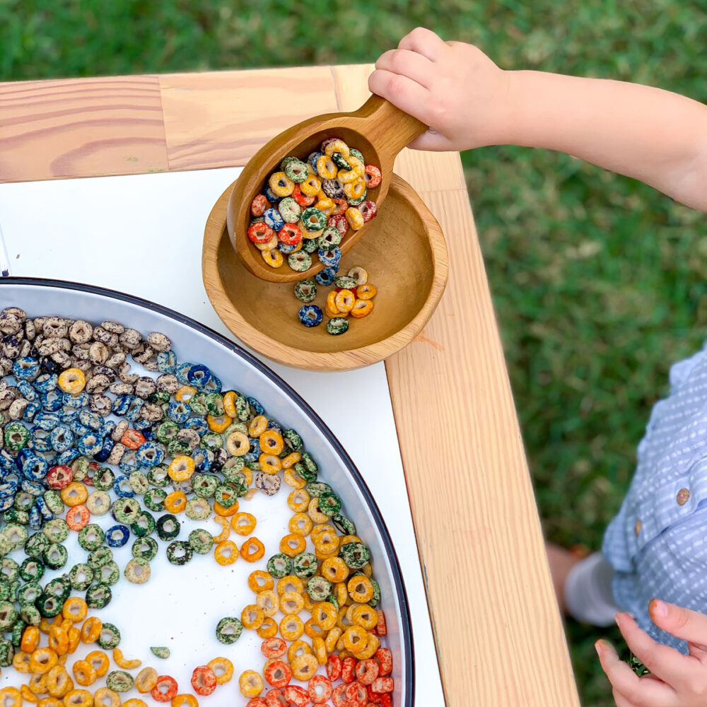 activity for toddlers colorful taste safe cereal sensory bin